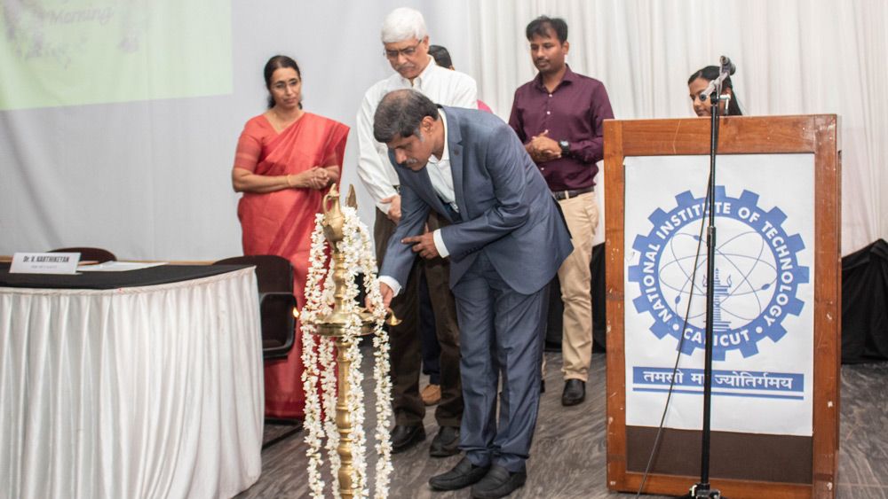Pradeep Kumar of Bosch India lighting the ceremonial lamp with Dr.  Sivaji Chakravorti of NIT Calicut before signing the agreement.