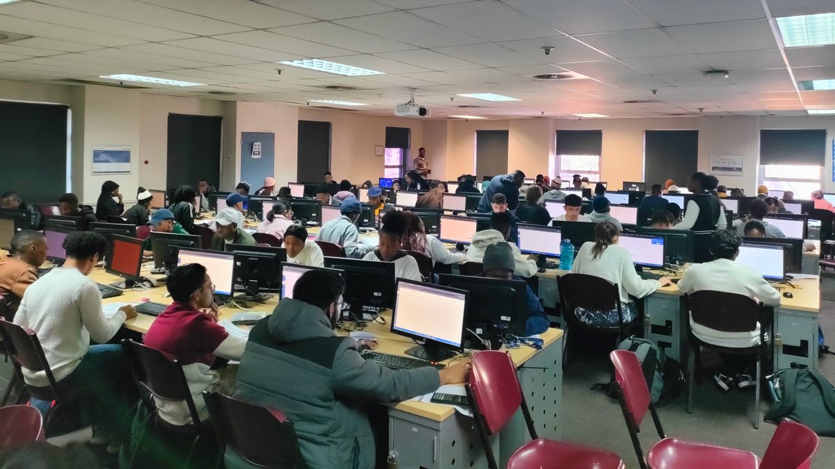 Several students working on computers.