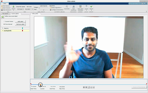 Video Labeler window with individual waving at camera, labeled with "wavingHello" ground truth.