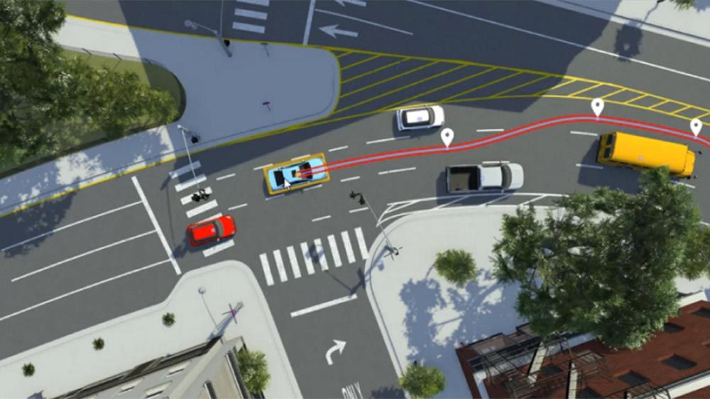 Véhicules, dans un exemple de RoadRunner Scenario, se déplaçant dans une intersection complexe.